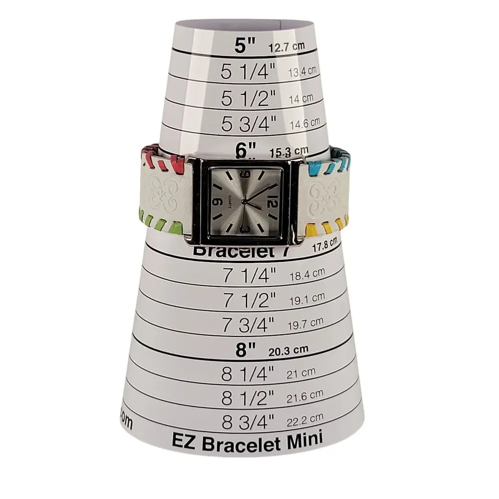 Silver Quartz Watch with Embossed Cuff White Leather Strap and Multicolor Design